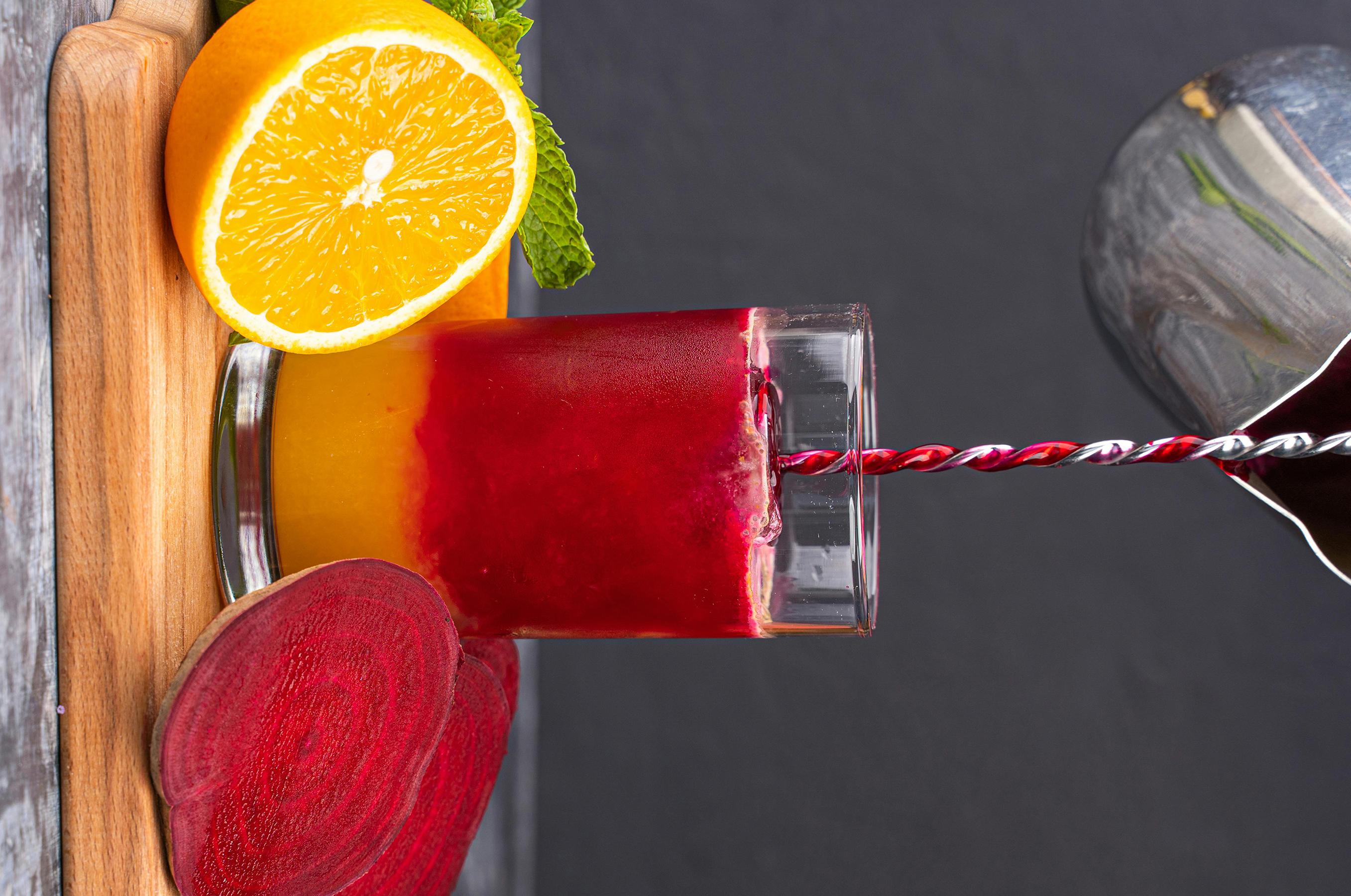 Happy Press Co. window wrap panel with beet juice imagery